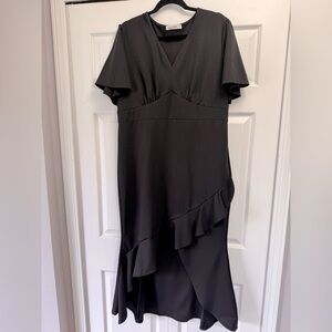 Stunning formal black dress. Very slimming! Size XXL.